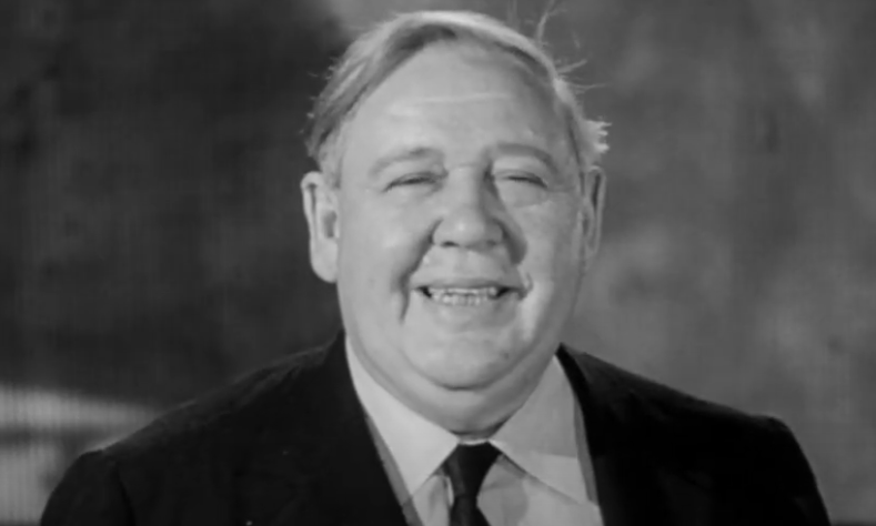 Charles Laughton as Sir Wilfrid Robarts