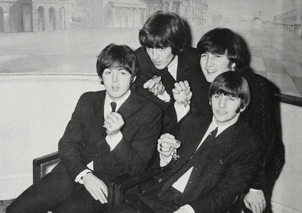 Black and white group photographs of the Beatles