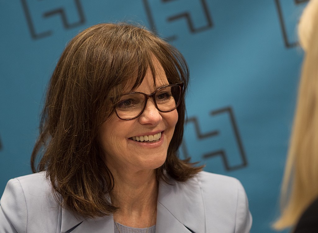 Sally Field wearing gray jacket