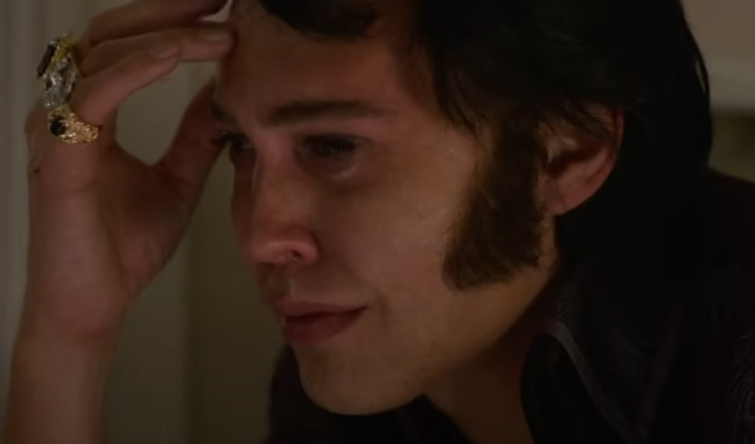 Austin Butler as Elvis Presley in a black shirt