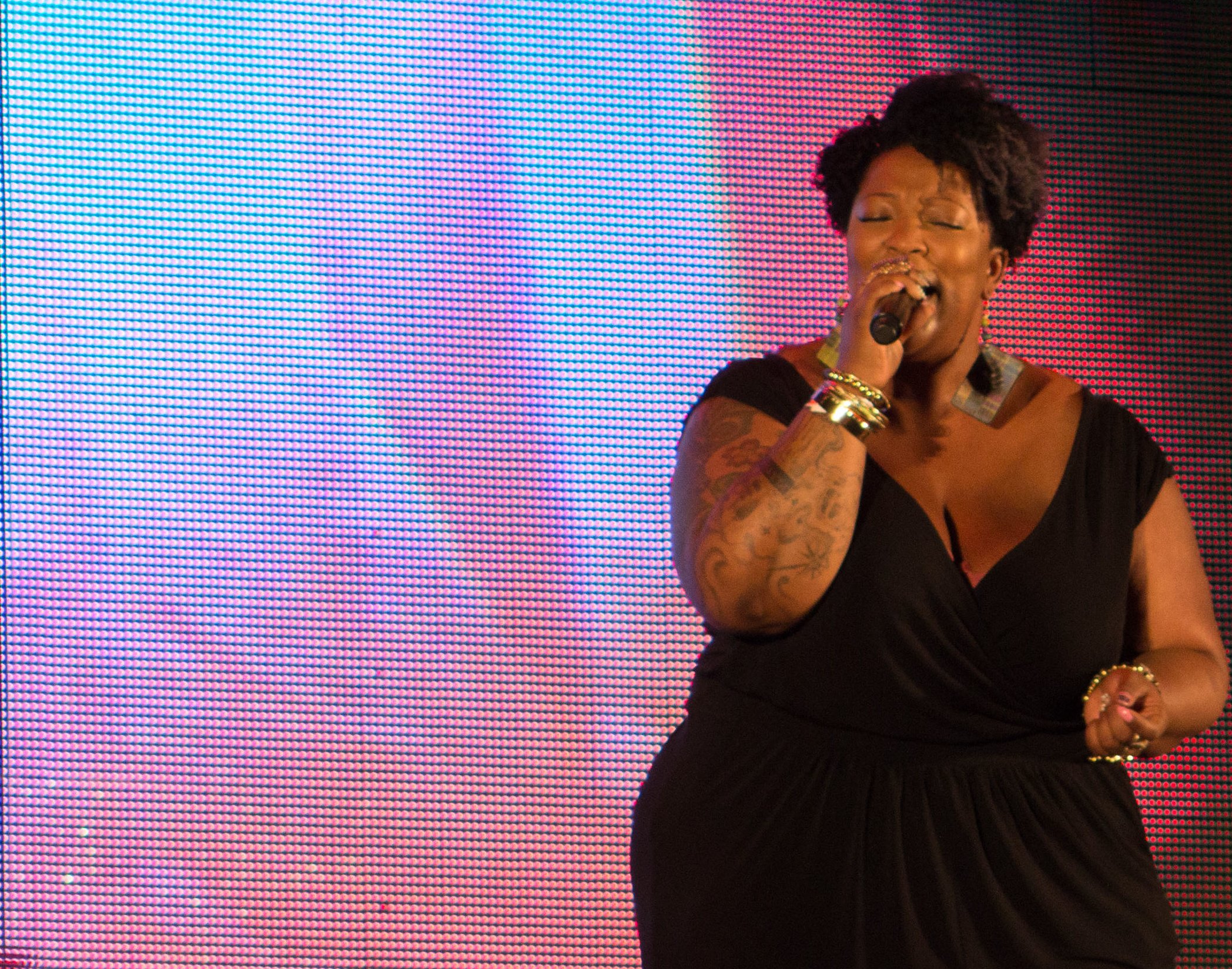 Frenchie Davis in black dress