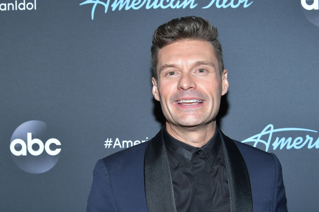 Ryan Seacrest in blue suit