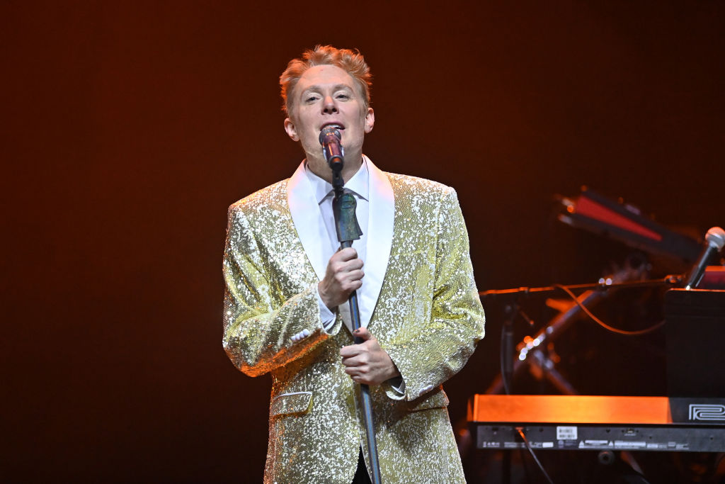Clay Aiken in a gold suit
