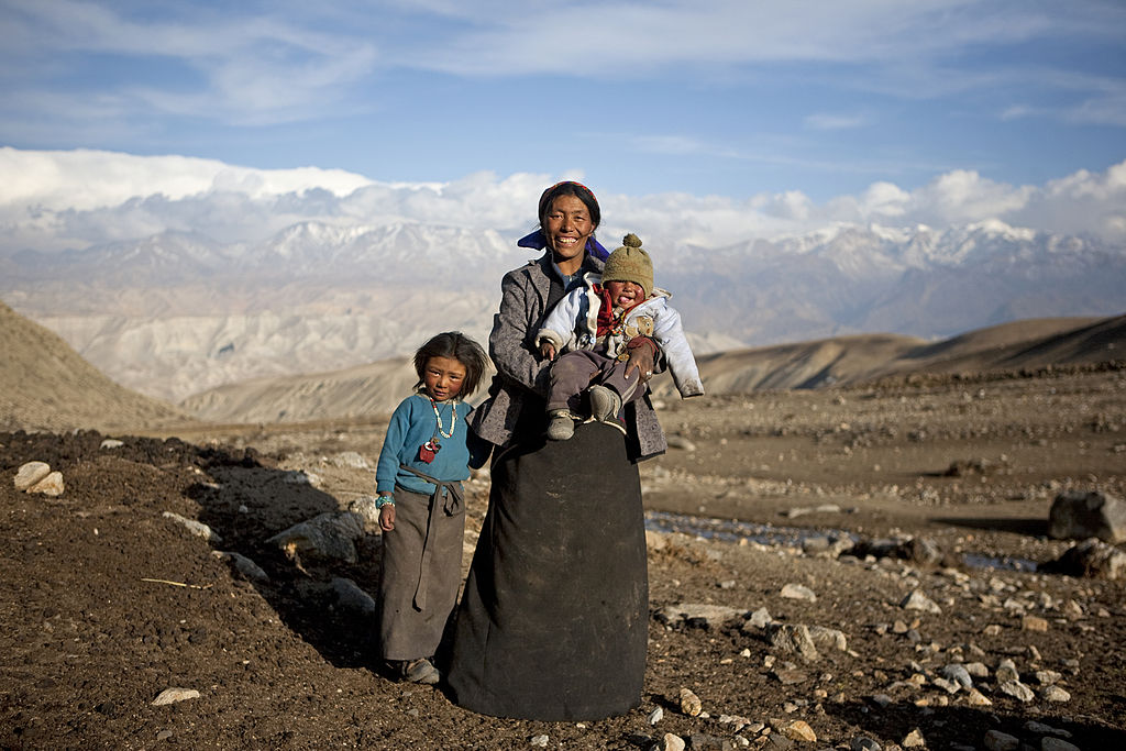 : A Loba nomad family stands for a portrait in their winter camp a few hours from Lo Manthang