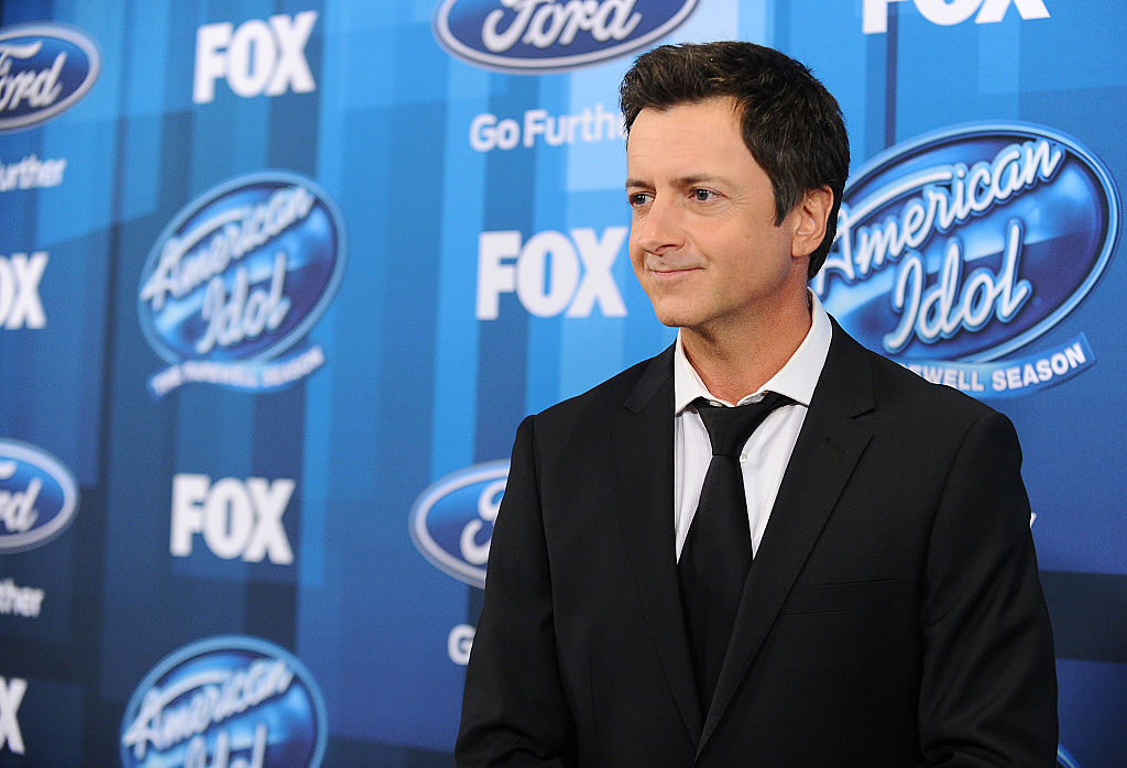 Brian Dunkleman in a black suit
