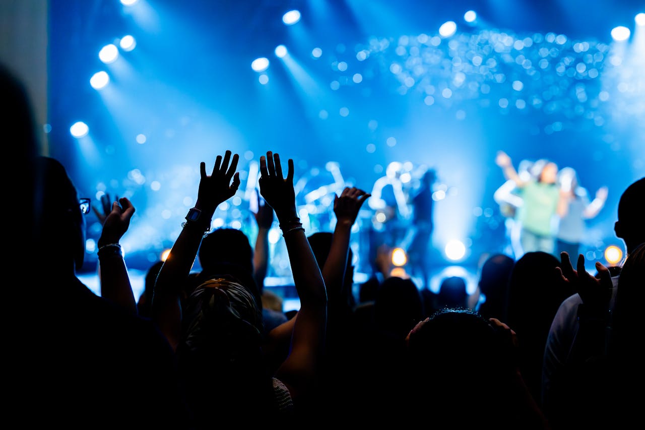 Crowd with arms raised