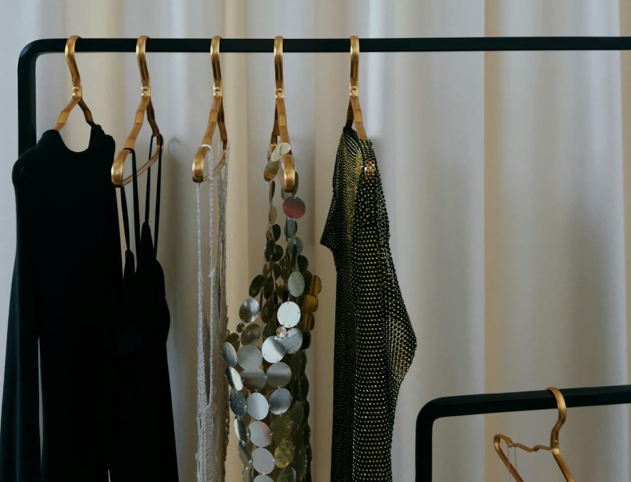 Dresses hanging on a clothing rack