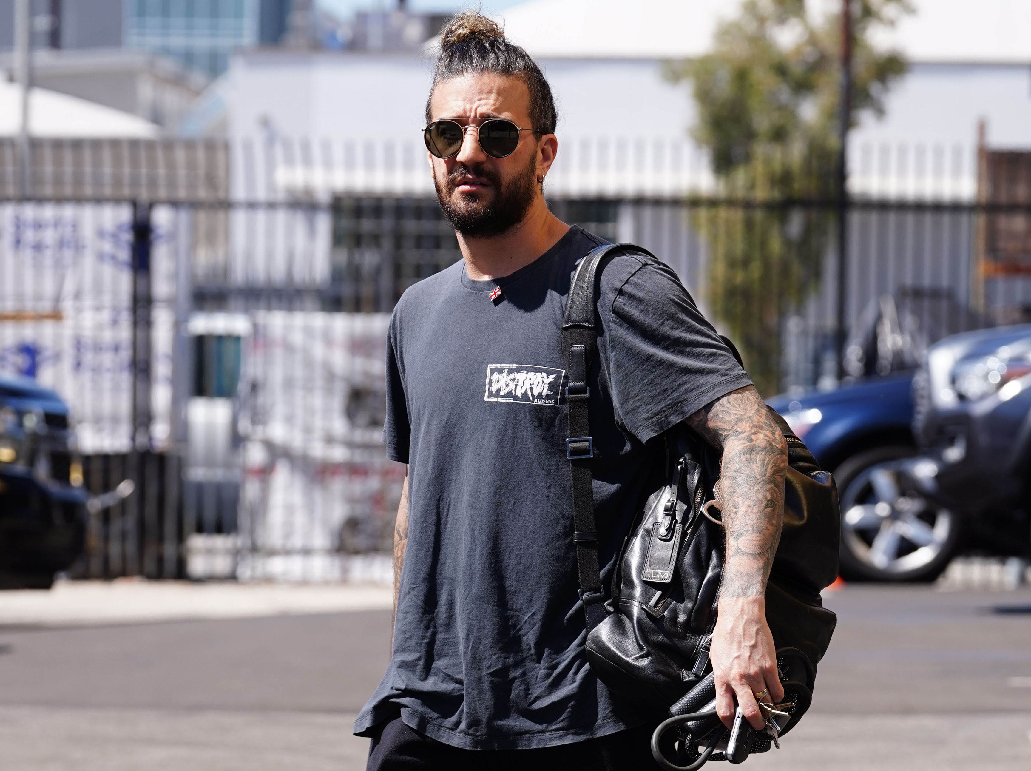 Mark Ballas in a gray t-shirt