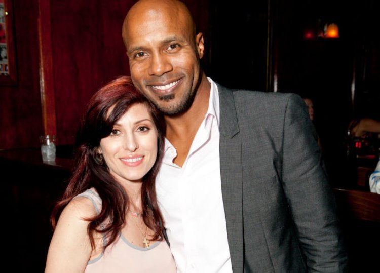 Zena Shteysel in pink top and Director Danny in grey jacket