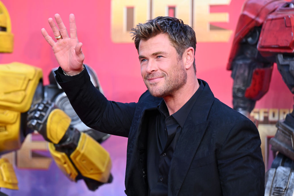 Chris Hemsworth in a black suit