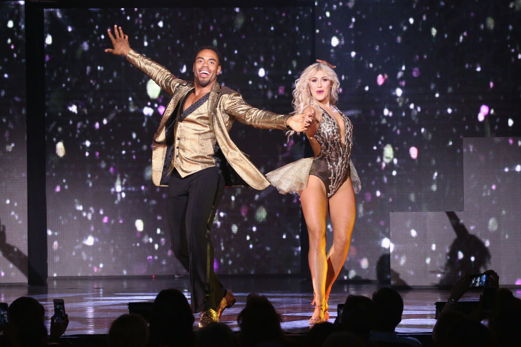 Rashad Jennings and Emma Slater perform at the Dancing With The Stars