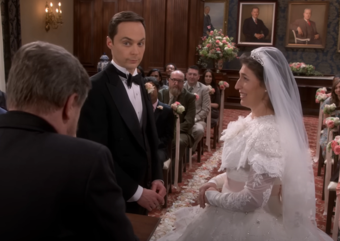 Screenshot of Jim Parsons (Sheldon Cooper) and Mayim Bialik (Amy Farrah Fowler) getting married from - The Big Bang Theory (2007-19)