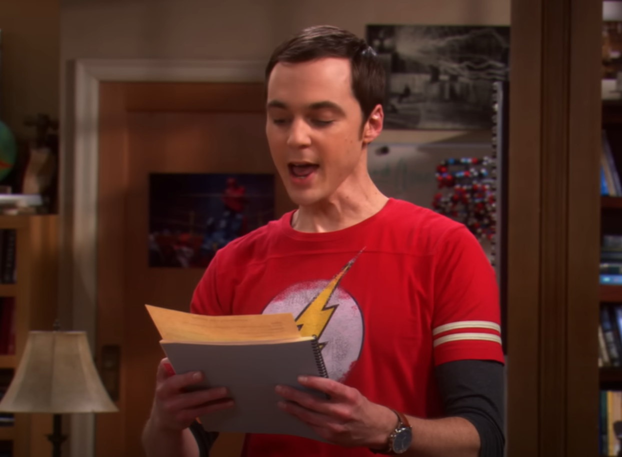 Screenshot of Jim Parsons (Sheldon Cooper) reading from - The Big Bang Theory (2007-19)