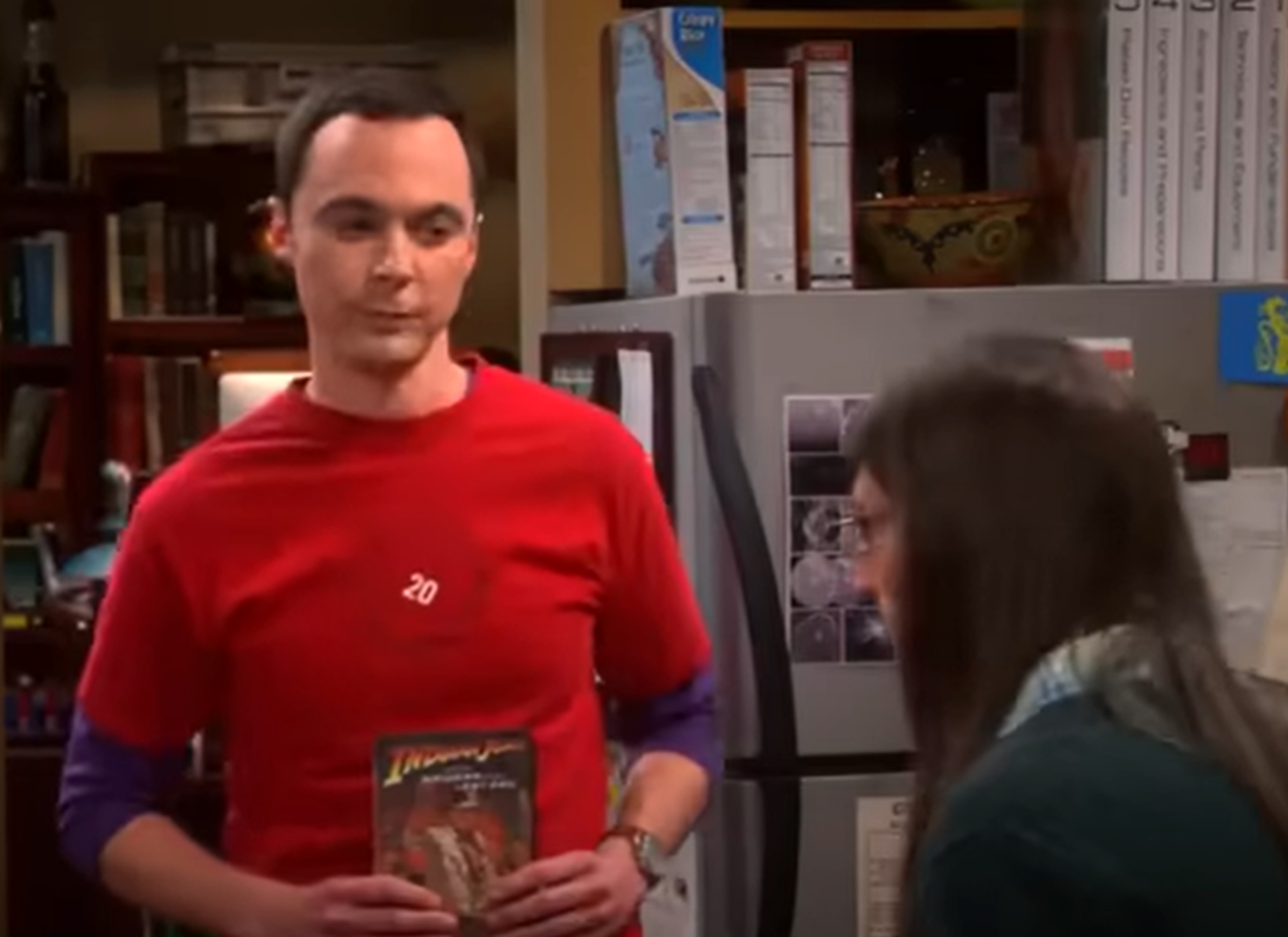 Screenshot of Jim Parsons (Sheldon Cooper) and Mayim Bialik (Amy Farrah Fowler) talking in kitchen from - The Big Bang Theory (2007-19)
