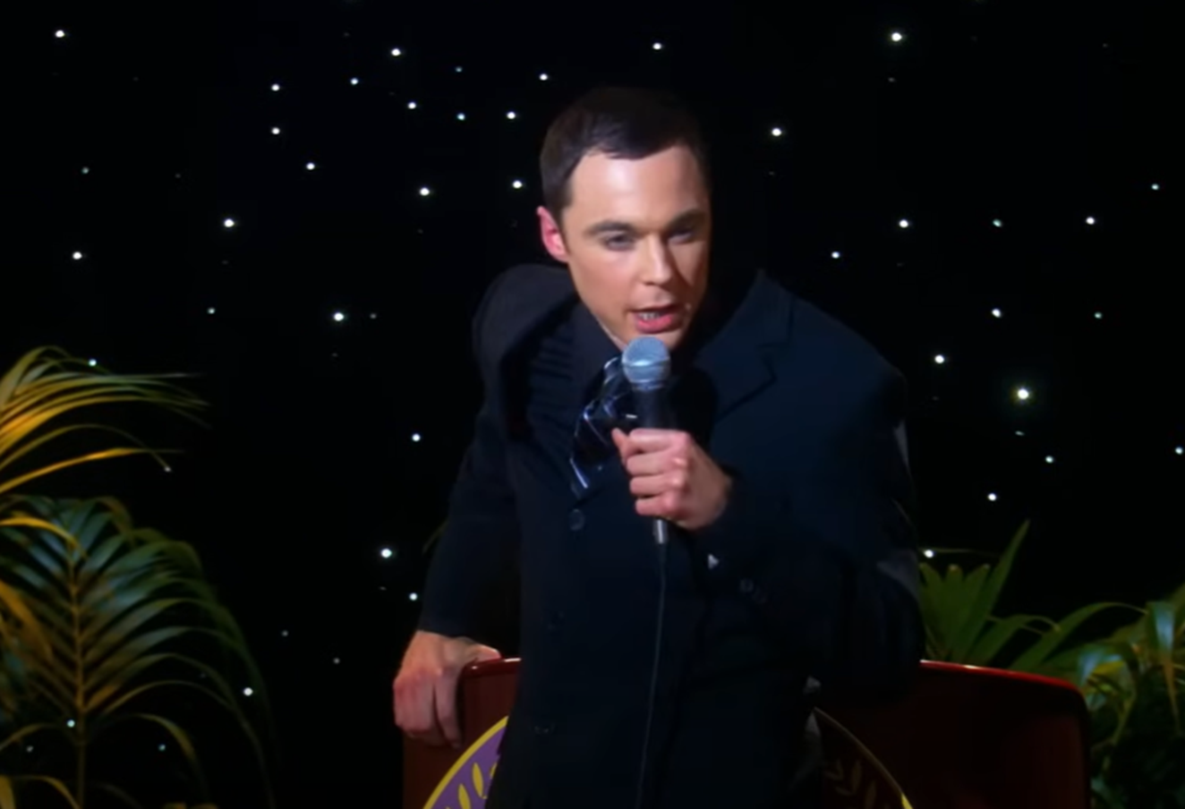 Screenshot of Jim Parsons (Sheldon Cooper) talking on stage from - The Big Bang Theory (2007-19)