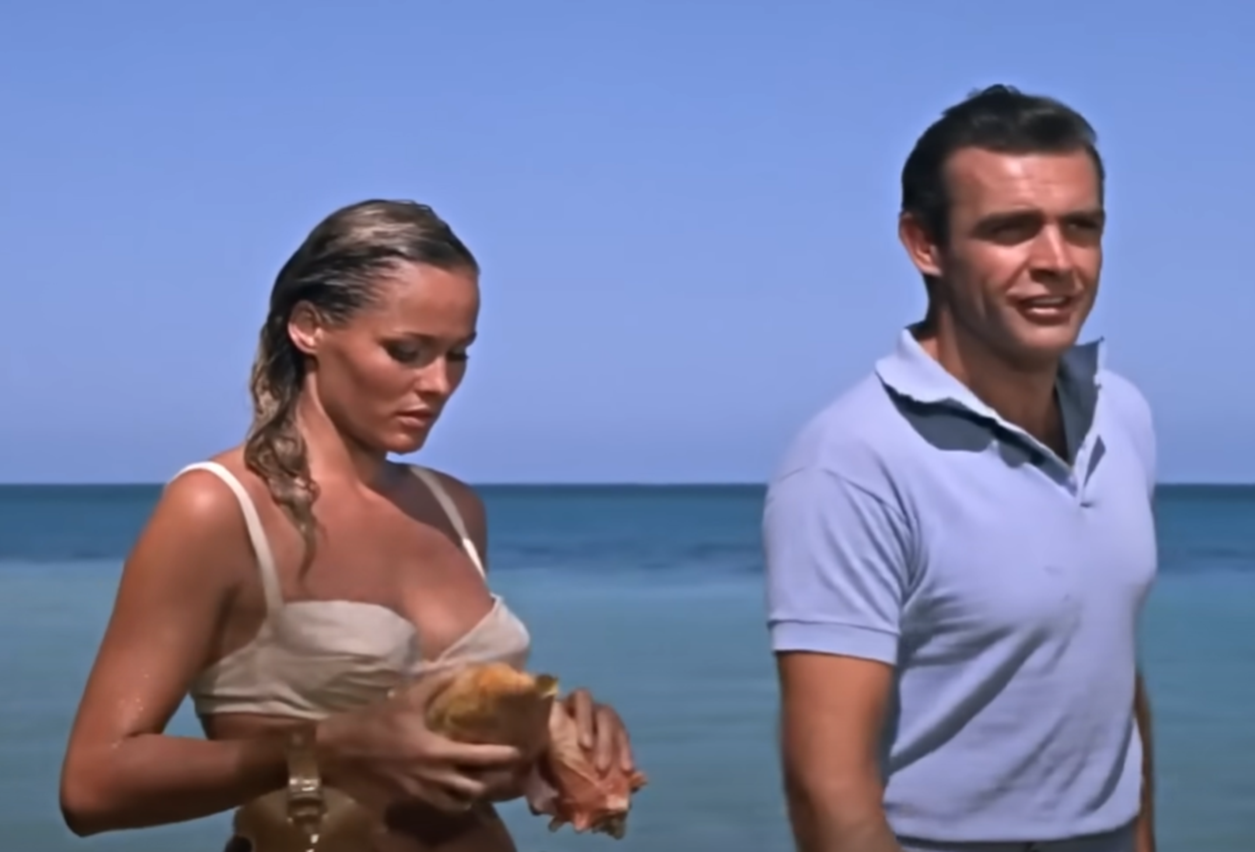 Screenshot of Sean Connery and Ursula Andress in Dr. No (1962)