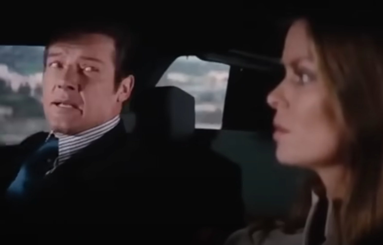 Screenshot of Roger Moore and Barbara Bach in The Spy Who Loved Me (1977)