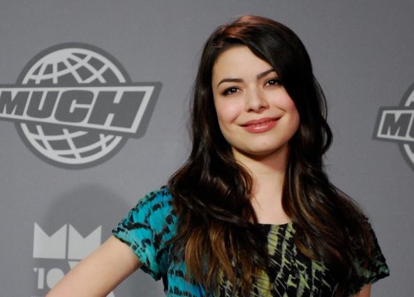 Miranda Cosgrove smiling at the camera