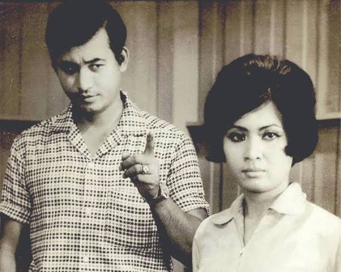 Mitr Chaibancha in plaid shirt