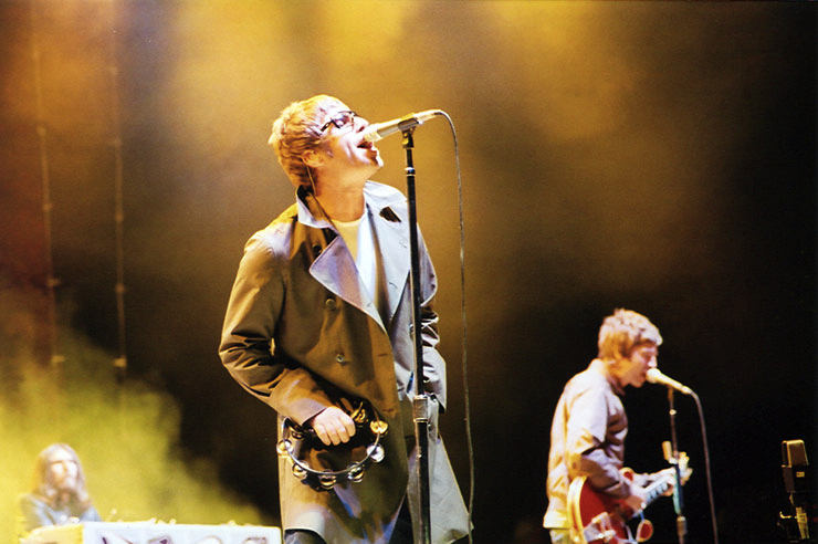 Liam and Noel Gallagher of Oasis performing in San Diego