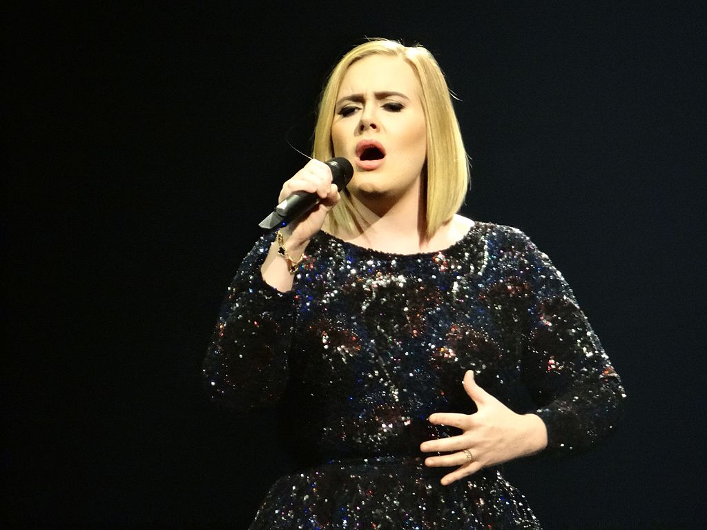 Portrait Photo of singer-songwriter Adele performing on stage
