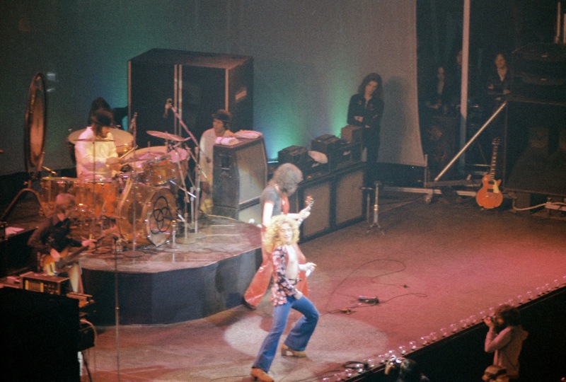 Portrait Photo of Led Zeppelin Members Performing on Stage