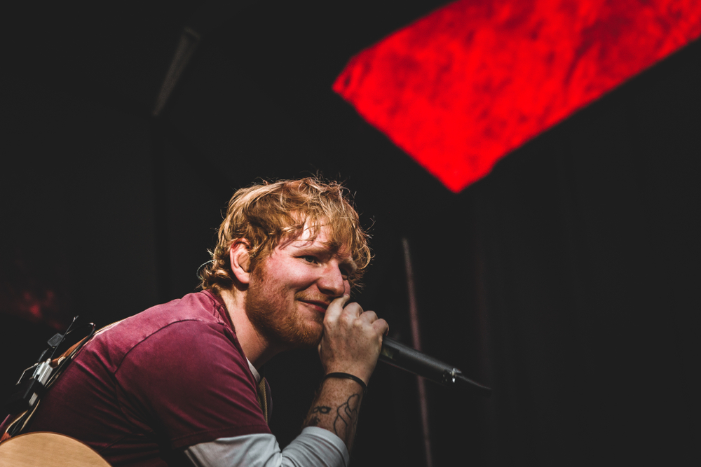 Portrait Photo of British singer Ed Sheeran during his performance
