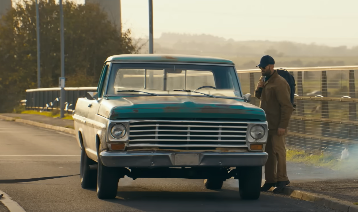 A screenshot of the movie The Beekeeper