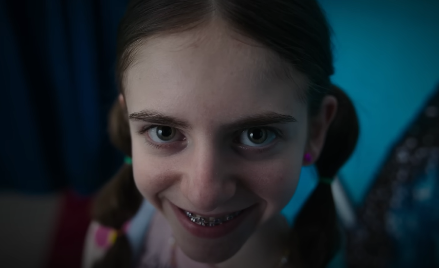 A screenshot of the movie Smile 2
