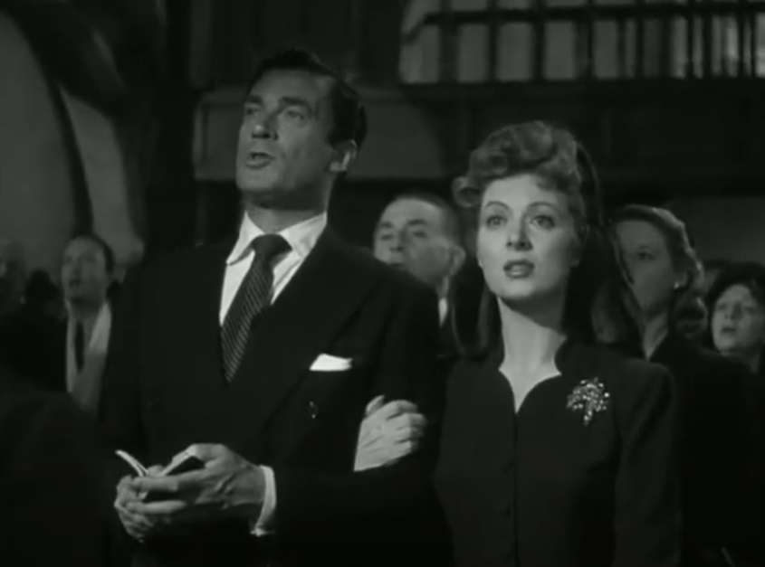A visually captivating still taken from a pivotal moment in the film Mrs. Miniver (1942)