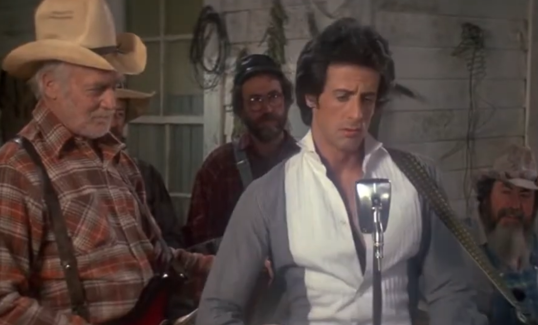 Screenshot from the movie Rhinestone (1984)