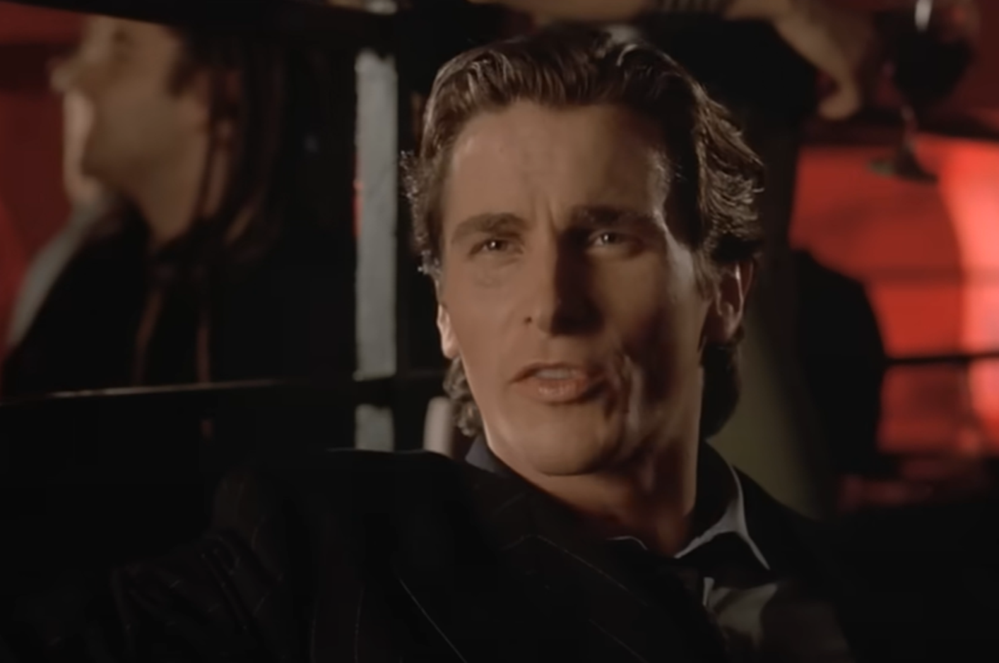 Screenshot of Christian Bale in American Psycho (2000)