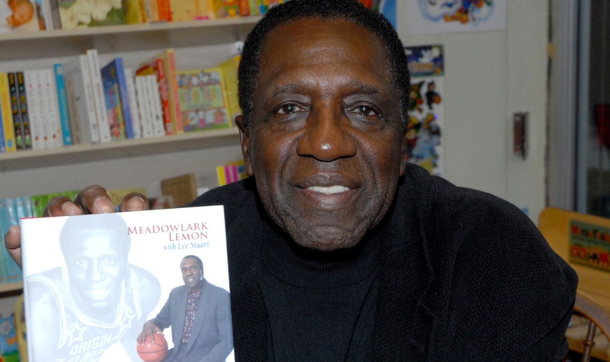 Meadowlark Lemon Signs Copies Of 