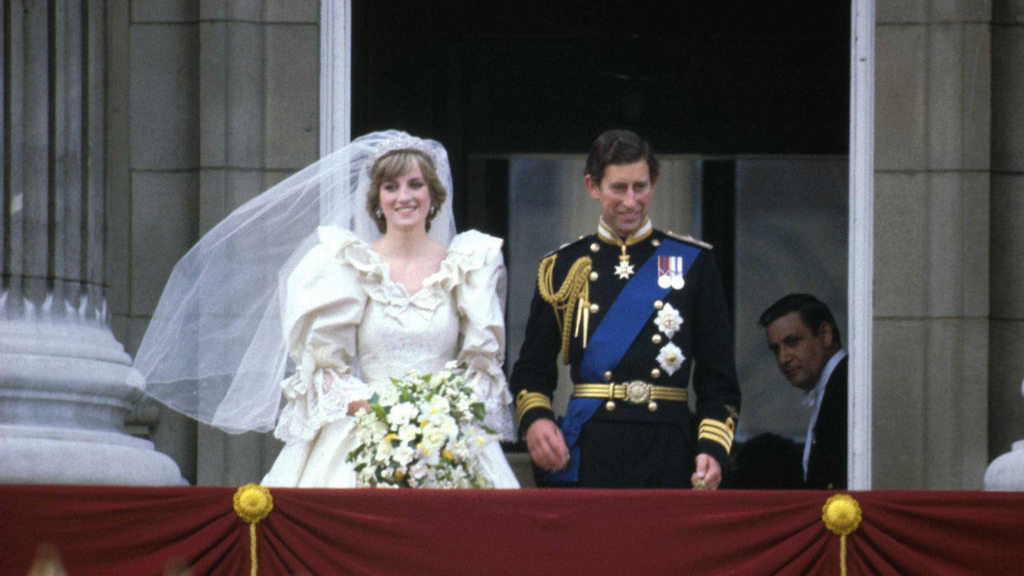 Prince Charles & Princess Diana (1961 - 1997) stand on the balcony of Buckingham Palace after their wedding ceremony at St. Paul's Cathedral, London, England, July 29, 1981.