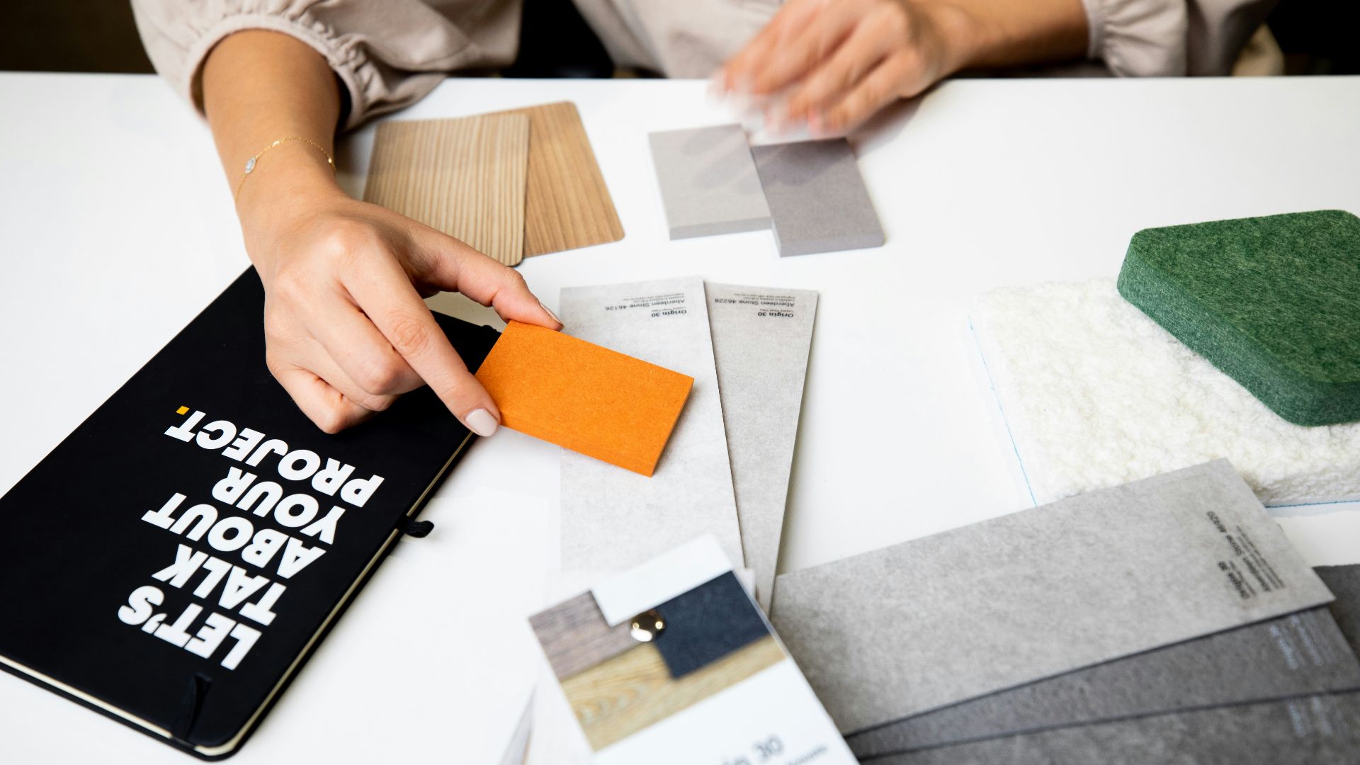 a person writing on paper