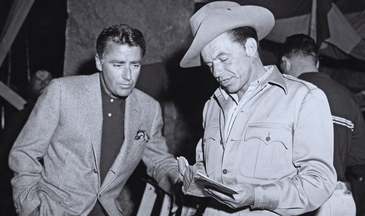 Gettyimages - 	514897456, Peter Lawford with Frank Sinatra (Original Caption) Candid Hollywood...Frank Sinatra and Peter Lawford, two of Hollywood's most debonair stars, have been long-time friends and golfing cronies.