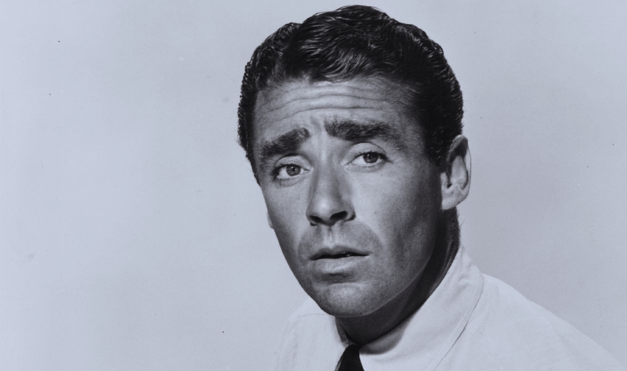 Gettyimages - 488971367, Peter Lawford Promotional portrait of actor Peter Lawford sitting at a typewriter, circa 1950-1960.