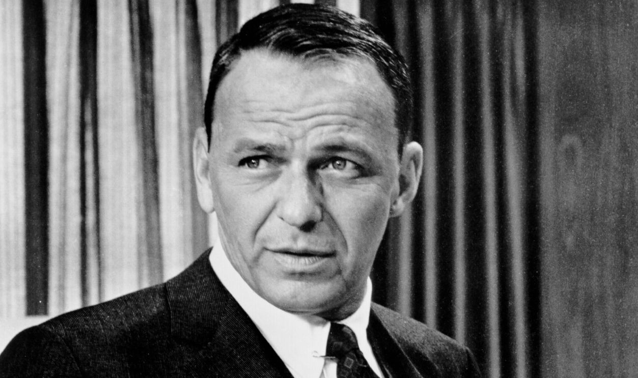 Entertainer Frank Sinatra performs in a scene from a movie in circa 1965. 