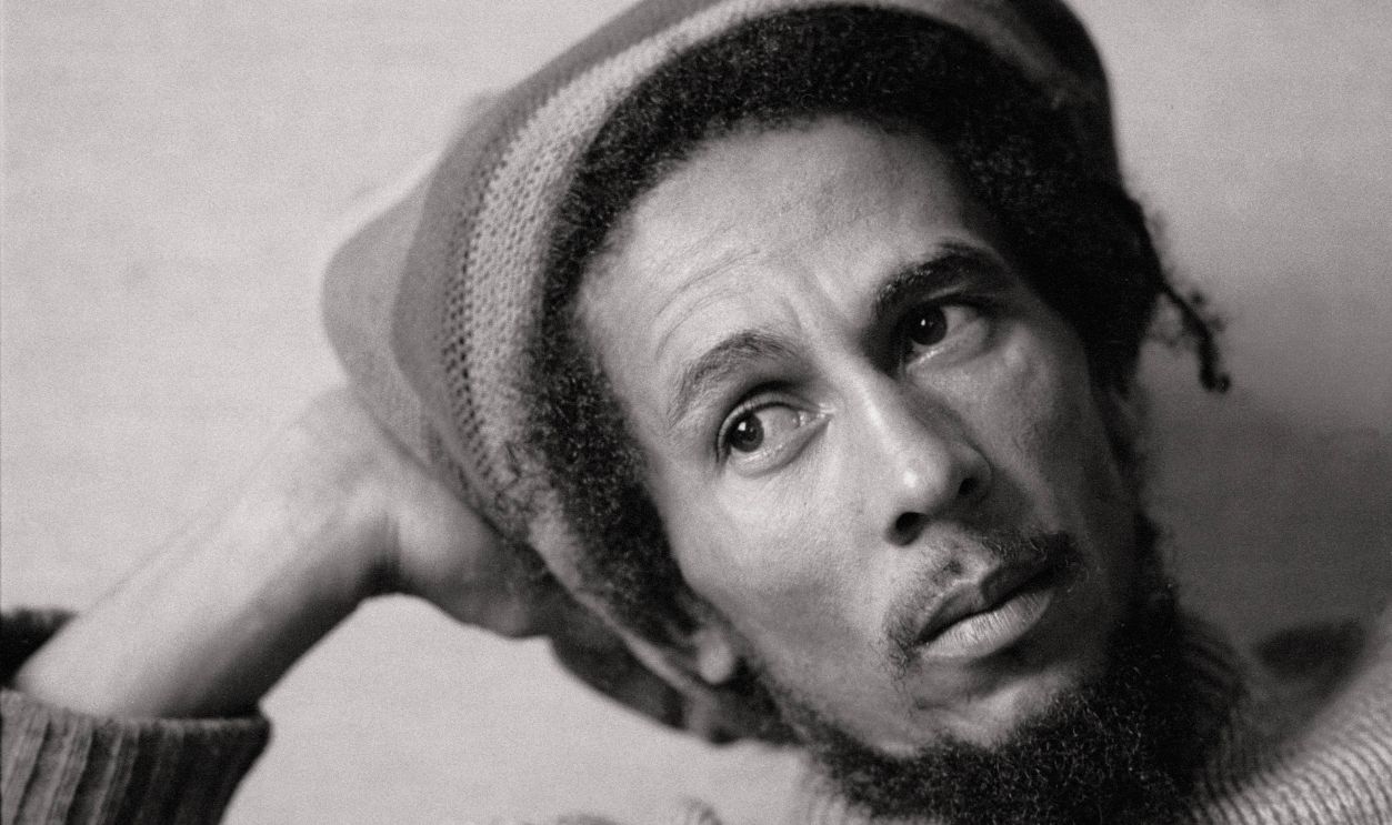 Bob Marley, singer The singer sat with a Jamaican cap