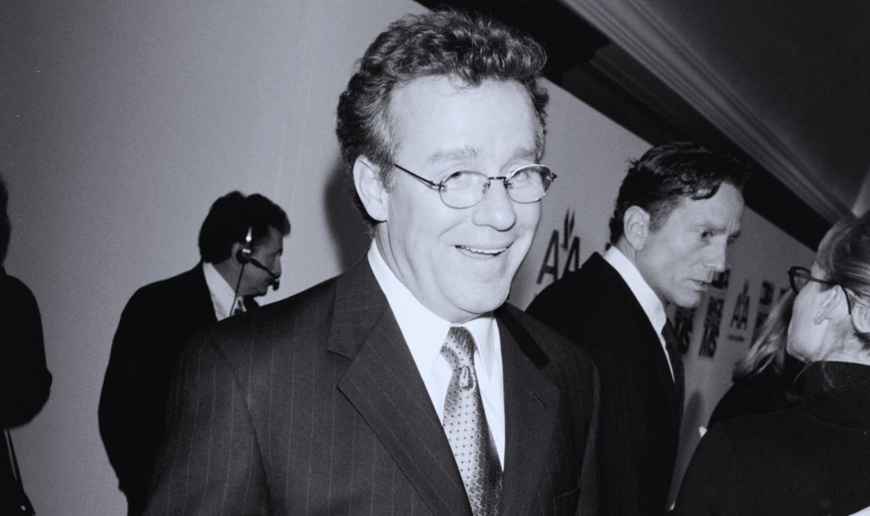 Gettyimages - 1718968681, Sixth Annual Race to Erase MS Benefit Phil Hartman (foreground) attends the sixth annual Race to Erase MS benefit, sponsored by Tommy Hilfiger, at the Century Plaza Hotel in the Century City neighborhood of Los Angeles, California, on November 14, 1997. 