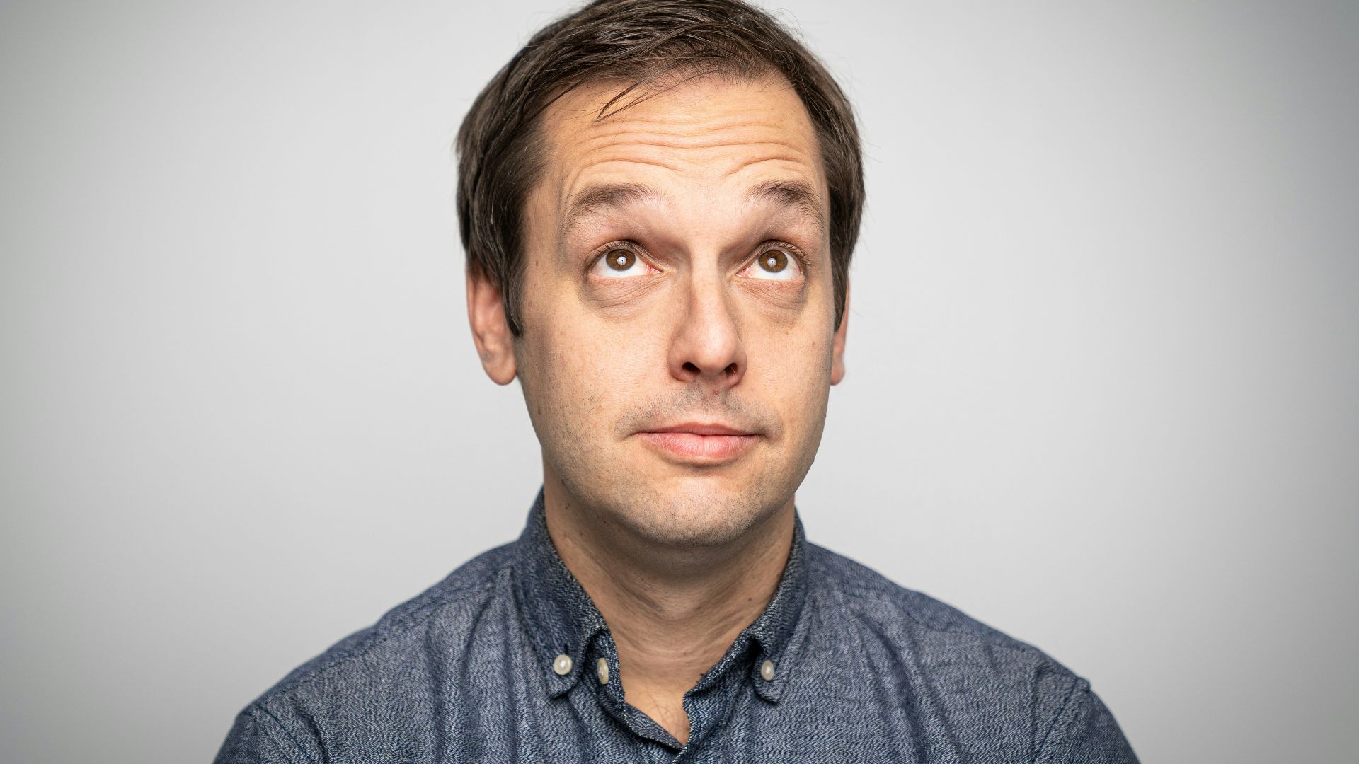 a man with a surprised look on his face