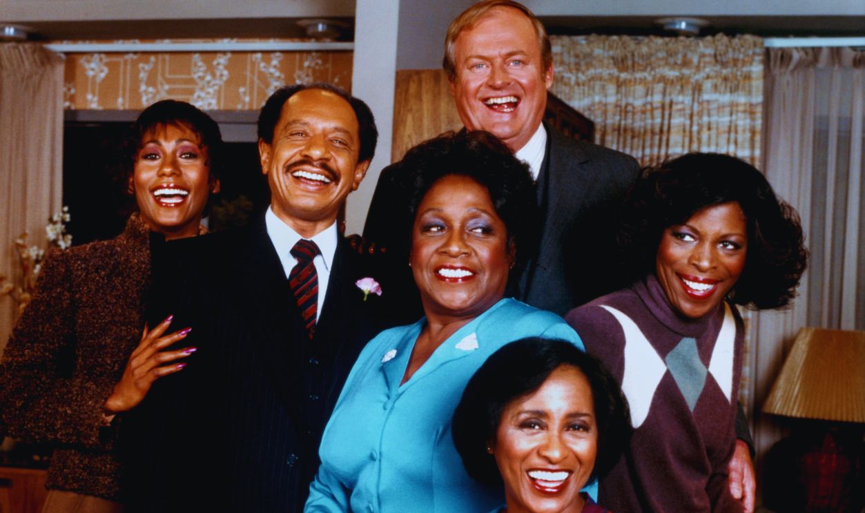 Gettyimages - 108479495, The Jeffersons LOS ANGELES - CIRCA 1977: The cast of the TV sitcom 'The Jeffersons' (L-R Berlinda Tolbert, Sherman Hemsley, Isabel Sanford, Franklin Cover, Roxie Roker and Marla Gibbs (seated)) circa 1977 in Los Angeles, California.