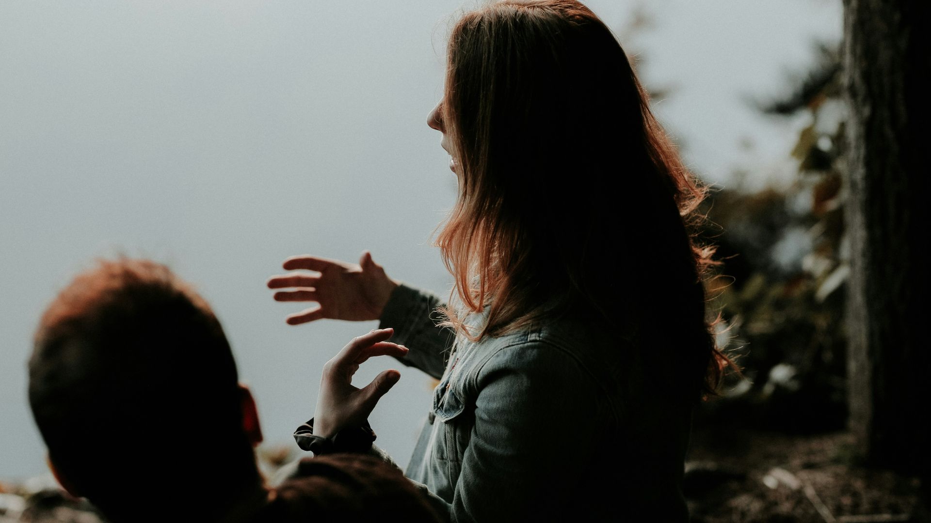 woman wearing gray jacket