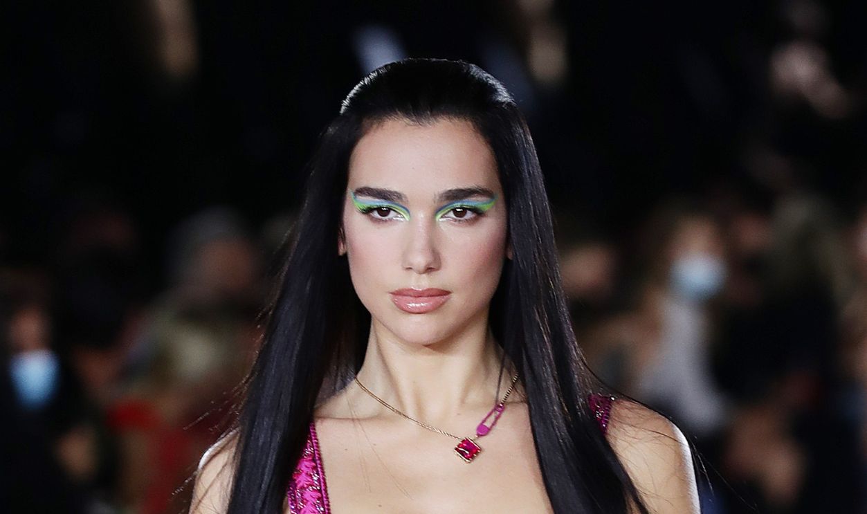 MILAN, ITALY - SEPTEMBER 24: Dua Lipa walks the runway at the Versace fashion show during the Milan Fashion Week - Spring / Summer 2022 on September 24, 2021 in Milan, Italy.