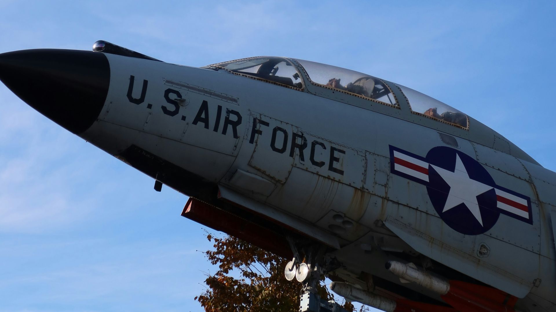 a fighter jet flying in the sky