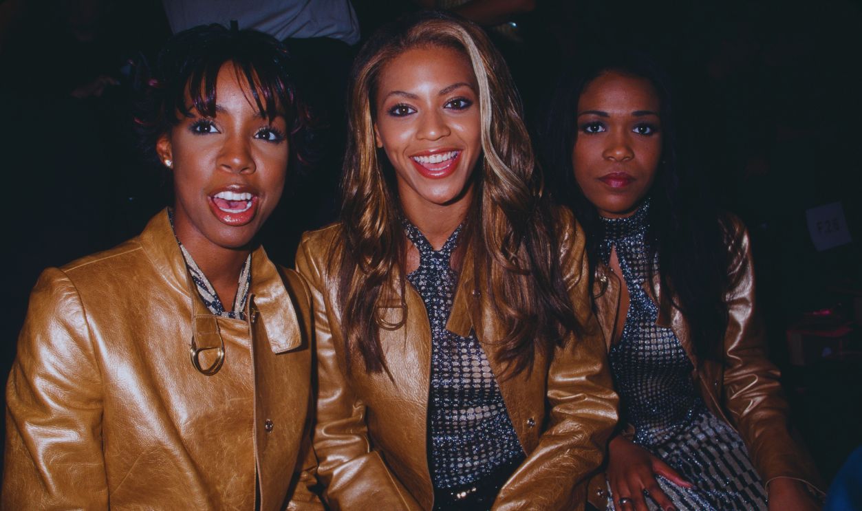 Gettyimages - 570135177, Destiny's Child American R&B girl group Destiny's Child attends the Betsey Johnson Bunnies Spring 2001 fashion show, New York City, USA, circa 2000. L-R: Kelly Rowland, Beyonce Knowles, and Michelle Williams.