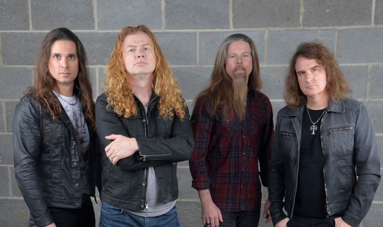 Group portrait of Megadeth, Wembley Arena, London, 14th November 2015. L-R Kiko Loureiro, Dave Mustaine, Chris Adler, David Ellefson. (