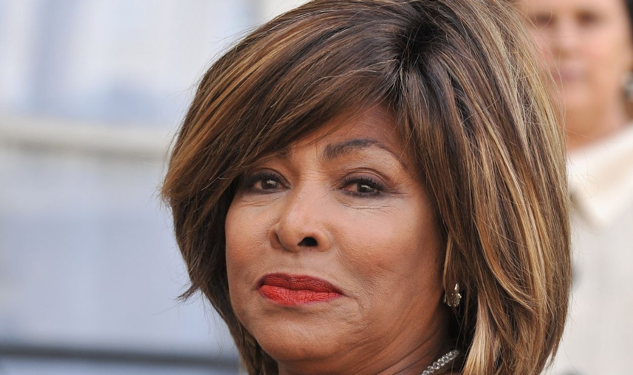 Singer Tina Turner poses in the courtyard of the Elysee Palace before attending a ceremony at the president's official residence for honorees of France's most prestigious Legion D'Honneur award on July 3, 2008 in Paris, France.