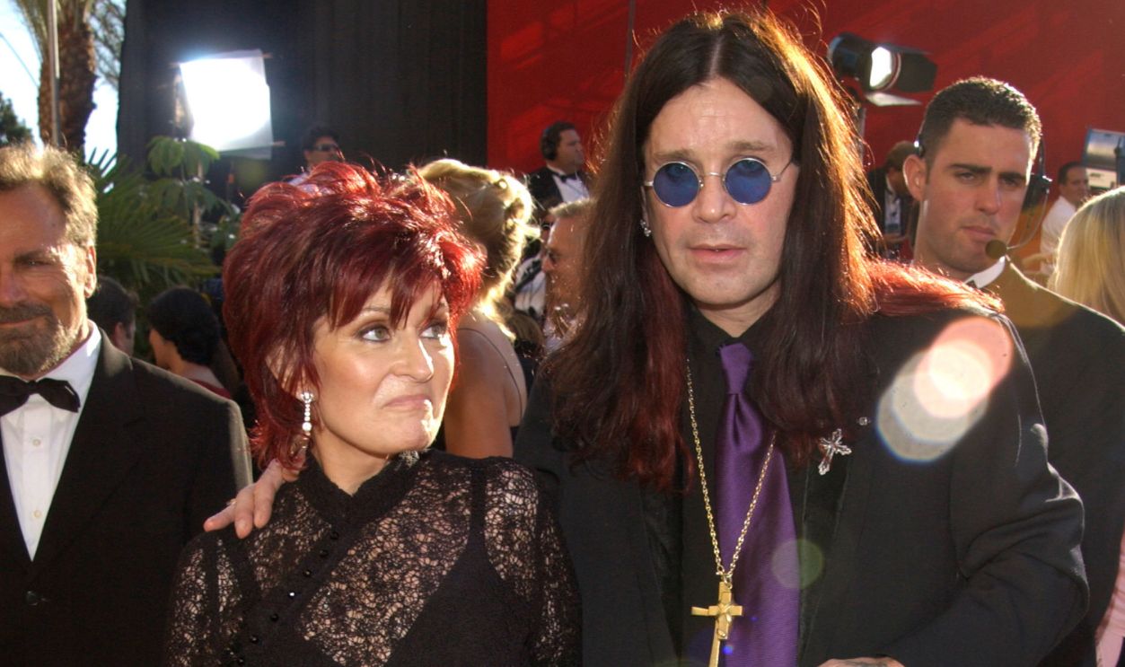 OZZY OSBOURNE & wife SHARON at the 2002 Emmy Awards in Los Angeles in black clothes