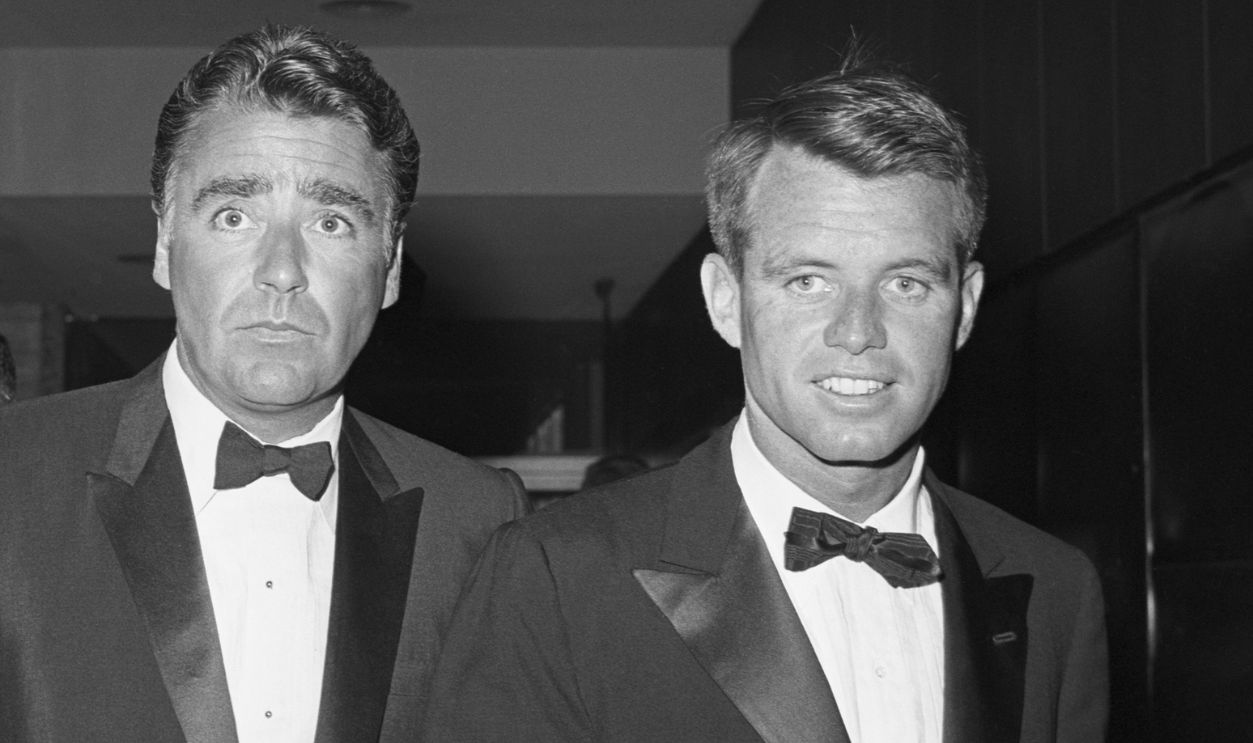 Peter Lawford and Robert Kennedy at a charity fund-raising dinner for a hospital, in Los Angeles. July 1961.
